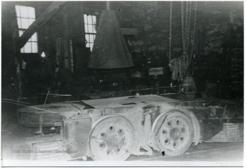 Locomotive inside of the machine shop.