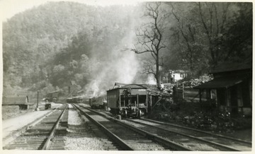 Buildings on both sides of the tracks.