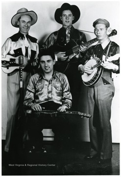 Group of four country musicians.