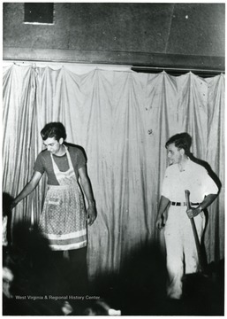 Two boys, possibly American Friends Service Committee Workers at Work Camp.