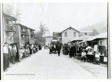 Union miners evicted by Liberty Fuel Co. 'White building on the right background was store where child lost hand to blasting cap-now site of post office. (L. Birurakis account 12/21/1992) Buildings on left still standing.'<br /><br />