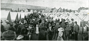 Scene in Twelfth Regiment Camp, Scranton. 'Showing how the miners and their families mingled on most friendly terms with the soldiers.'