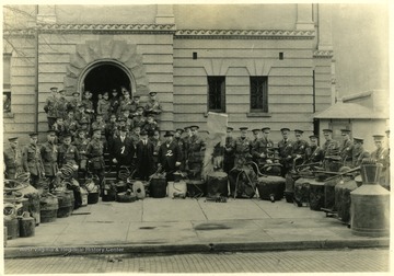 Officers stand with many homemade stills that were confiscated. 'Pix used on page 75 of [Lee's] book.'From Lee's book, 'Bloodletting in Appalachia,' : "1. Judge R. D. Bailey, who tried defendants in Massacre trials; 2. Major Tom B. Davis, who enforced martial law in Mingo County."