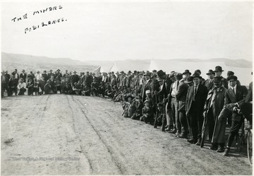 Group Photo of Miners and children