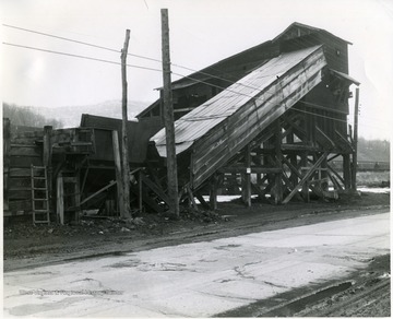 Christopher Coal Co. preparation plant and tipple beside a road.