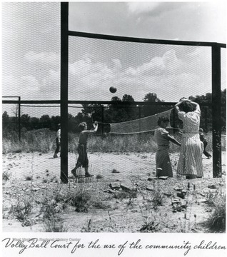 Children play volley ball on dirt court. Information on the back of the photograph, 'Album 359 FSA- Arthurdale W. Va. A print from the FDR Library collection. This print is furnished for your file and must not be reproduced without the owners permission.'