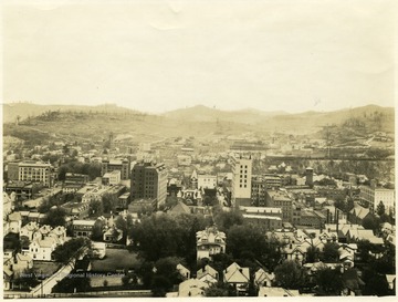 Homes and businesses in downtown Clarksburg as seen from Lowndes Hill.  Brick Courthouse in center of photograph.