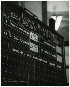 East Bound's train schedule from St. Louis and West Bound's train from Baltimore and Washington D.C. are listed on the Train Schedule Board in the train station at Grafton, W. Va.