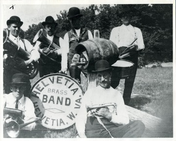 Six members of the Helvetia Brass Band with their instruments.