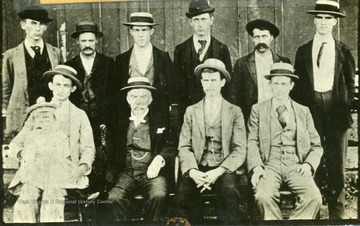 'Top: John Calhoun, E. P. Fullerton, unknown, Chas Delabar, unknown, Walter Beuhring. Bottom: Walter L. Irwin, Chas Hunter, Abe Pane [sic], unknown.'