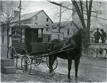 Horse-drawn buggy used for distributing laundry. 