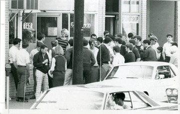 A crowd outside of Acropolis (Nick's) on Willey Street in Morgantown, West Virginia.