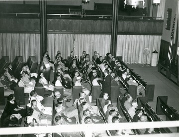 Congregation of Wesley United Methodist Church as seen from a balcony.