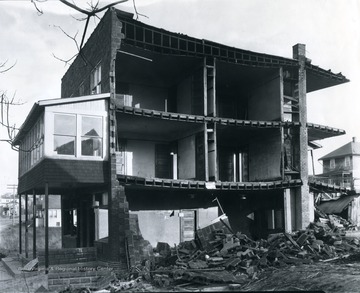 Rooms exposed after walls collapse due to high wind in a building along Dunkard Avenue in Westover, near Morgantown, W. Va. 