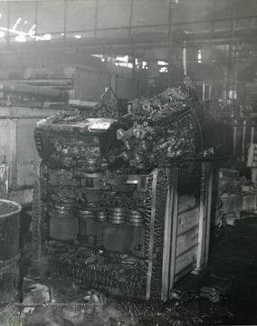 Damage of interior of Glass Plant after fire located in Star City, near Morgantown, W. Va. Machinery is visibly damaged. 