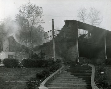 Damage caused by fire at Lakeview in Morgantown, W. Va.  Structure stands but is severely damaged and is still smoking. 