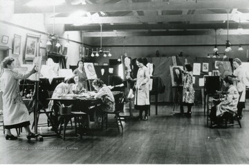 Women seen working on paintings at the Mt. de Chantal Academy in Wheeling, W. Va. 