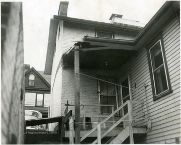 'Building that was torn down to build the Pleasant St. Parking Lot.'