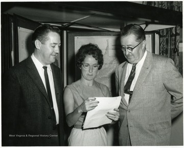 'On the right is Dr. Paul H. Price, State Geologist.'