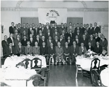 Sixth man from left in the bottom row is J. W. Ruby.