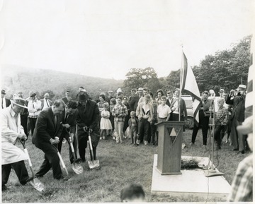 Left to Right, men with shovels are Bill Hart, Jennings Randolph, A. James Manchin, and unknown.