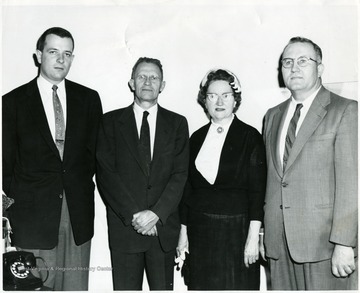 Mrs. Elmer Durk, second from right.