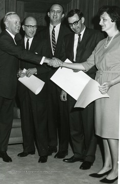 'Governor Smith' located on far left, third from left is 'Julius Singleton'. 