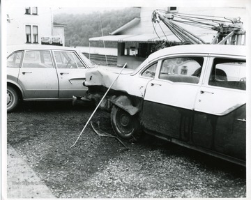 View of car with smashed rear passenger side in Morgantown, W. Va.