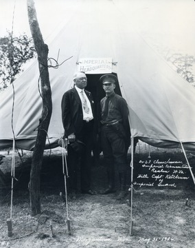 Dr. V.T. Churchman, Imperial Representative Realm, W. Va. and Captain Ketchum of the Imperial Guard stand for a portrait during a Ku Klux Klan meeting. Print number 1062.