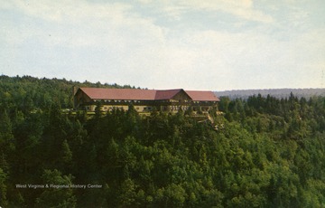 Caption on back of postcard reads: "Hub of year-round activities in this mountain wonderland. Its unsurpassed scenic beauty, plus fishing, hunting, skiing, etc., make this area a mecca for thousands of visitors annually." Published by Neale's Drug Store Incorporated. (From postcard collection legacy system.)