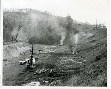 Land is being cleared.  Photo says it is now Wilson Garage.