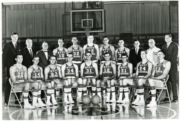 Row one- Bill Ryczaj, Ricky Ray, Bill Maphis, Marty Lentz, Bob Camp, Buddy Quertinmont, Rudy Zatezalo, Perry Polinsky, Bob Benfield.  Row two- Asst. Coaches Bob Lochmueller and Quentin Barnette, Equipment Mgr. Carl Roberts, Dave Palmer, Jerry Meadows, John Lesher, John Cavacini, Gary Shaffer, Mgr. Lance Kauf, Trainer Whitey Gwynne, Coach George King.