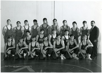 'Row 1:  Donn Lornier, Cliff Bononi, Joe Fedor, Marv Warner, Dave McCandless, Jerry Johnson, Jere Engle.  Row 2:  Jack Cargnoni, Steve Orlosky, Roger Lamens, Bob Bettorel, Coach George Nedeff.  Row 3:  Mitch Finchum, Jim Morris, Bob Scott, Jim Leete, Dave Najor, George Elias, Don Roofner, Tom Cunningham, Neil Obenshein.'