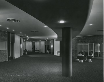 View of people in lobby of CAC. The woman on the right is Betty Metz.