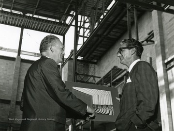 Dr. Duncan checking construction of Creative Arts Center