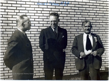 Howard W. Palmer (Center).