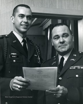 Cadet Col. Minney (left), and Col. Edwin Reynolds (right).