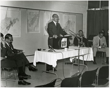 'Industrial leader and WVU alumnus C. Howard Hardesty addresses the Man and His Community symposium.'