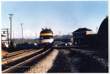 'C.&amp; O. gas-electric motor car 9054 &amp; trailer on train no. 50 on Huntington-Logan  line at Barboursville, W. Va..  In Cabell County, southeast leg of Wye-Gas Electrics became the railroads answer for passenger-runs generated low income according to railroads but required by the interstate commerce commission.'