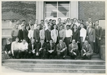 A group portrait of graduate students and instructors from the WVU Physics Department.