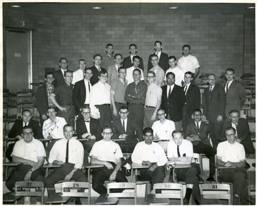 A group portrait of graduate students and instructors from the WVU Physics Department.