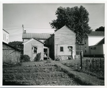 A back view of the Emanuel Benedum Home, where Michael L. Benedum was born in 1869.  The front of the house faces West Main Street