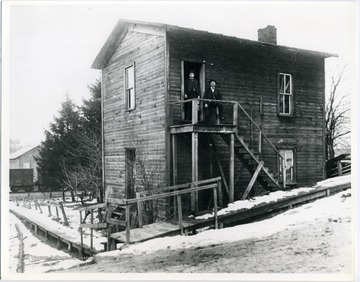 A house stands on the corner of Main Street and Virginia Avenue near Railroad Crossing across from the Old Stock Pens in Bridgeport, W. Va..