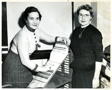 Violet Testso and Mrs. Delmas Miller.