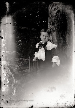 A portrait of Herbert Shock near a chair, Helvetia, W. Va.