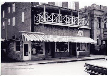 The Place of Fashion is located on Rt. 50; the fire department is to the left.  The building was once Town Hall and also housed Fitzhugh building and Knights of Pythias.