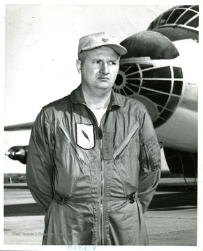 An unidentified male who is likely to be an airplane mechanic taken in the airfield.