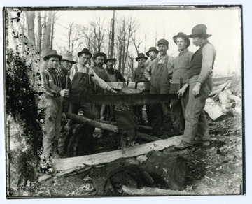 Left, front to back: Walter Stadler, Christian Burky, Ernest Burky, Emil Daetwyler, unidentified. Right, front to back: Gottfried Aegerter, Erwin Burky, John Betler, Otto Betler, Emil Metzener Sr.