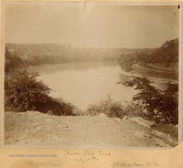 Mounted print showing portion of the Chesapeake and Ohio Canal on the right.