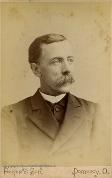 A cabinet card portrait of Reverend J. Engle. 